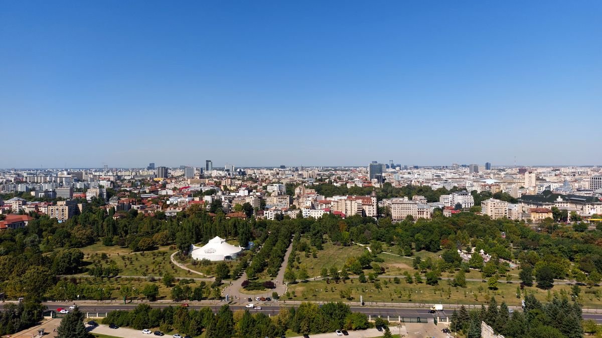 An aerial view over the rooftops and parks of Bucharest, Romania